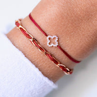 Armband Set dunkelrot Unico und Cloverleaf Zirkonia 925 Silber rosé am Handgelenk